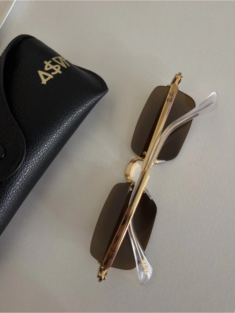 Ray-Ban Women Rimless Sunglasses with Brown Lenses and Gold Accents